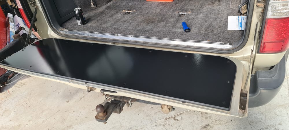 durable black tailgate chopping board use for camping and offroad suitable for use with landcruiser 80 series