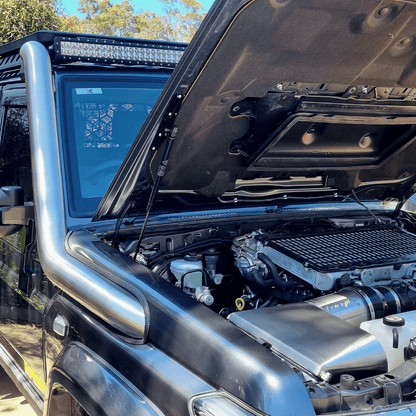 79 Series engine bay and snorkel installation context from Torqit