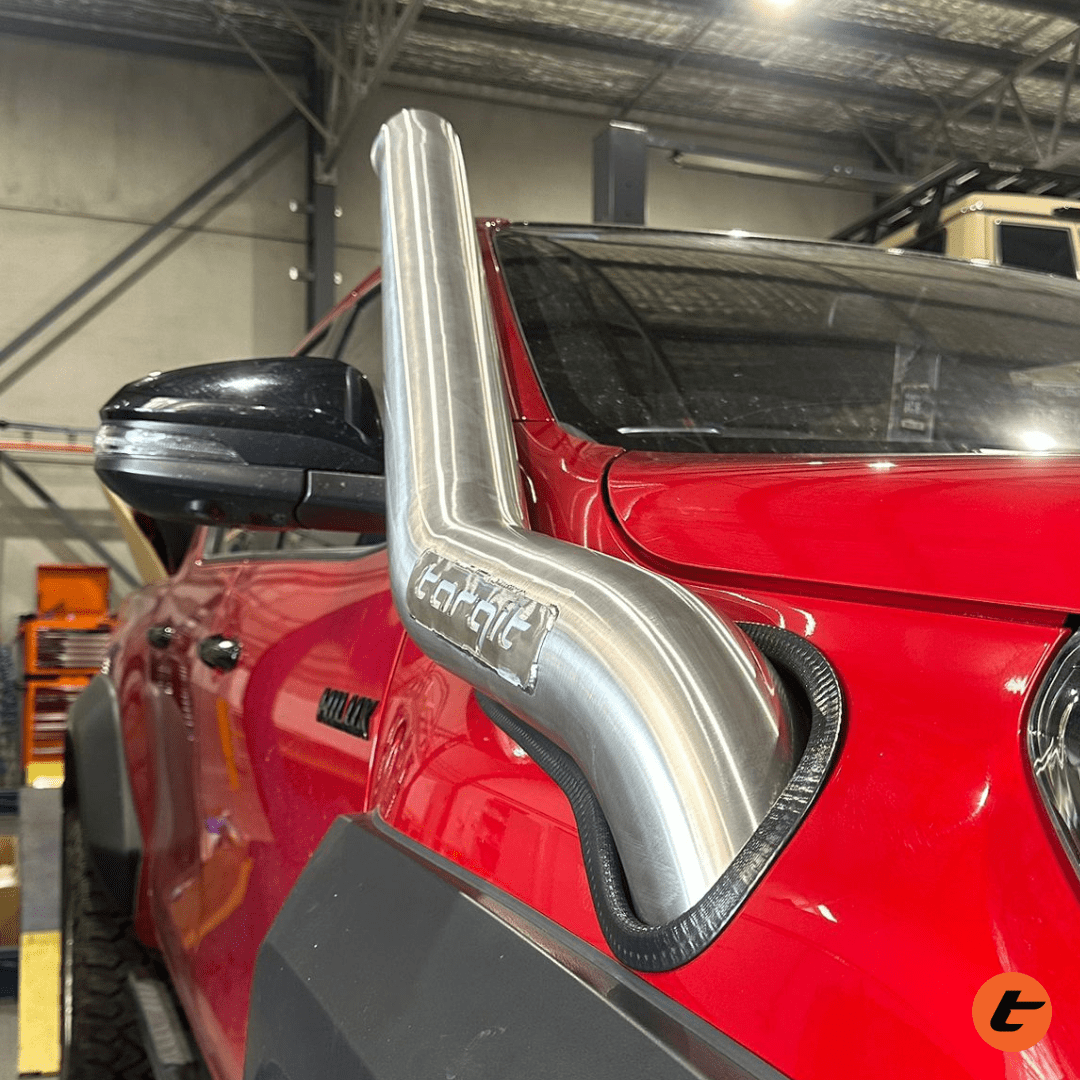 Torqit snorkel on Toyota Hilux 2.8L, stainless steel finish, view 1