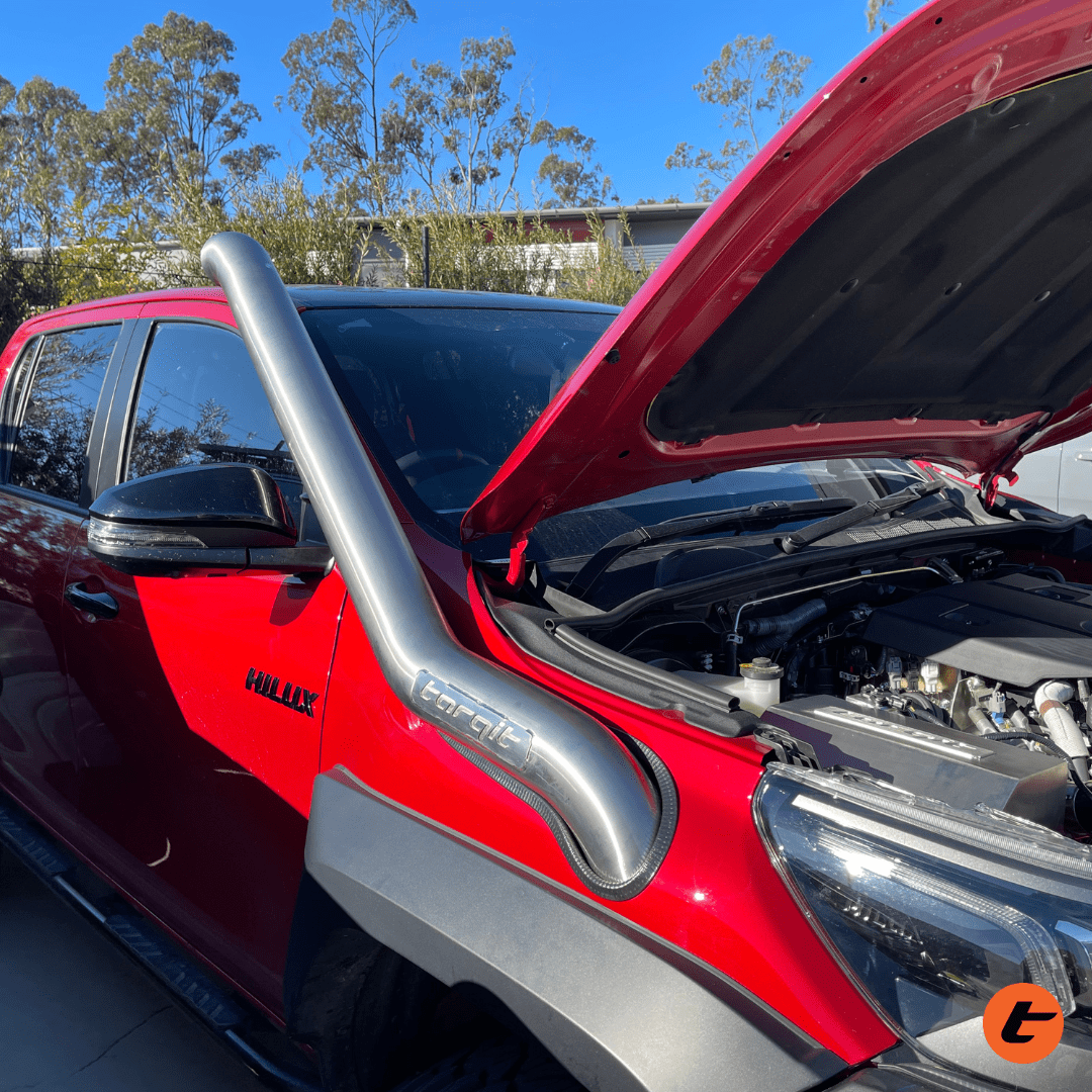 Torqit snorkel on Toyota Hilux 2.8L, stainless steel finish, view 3